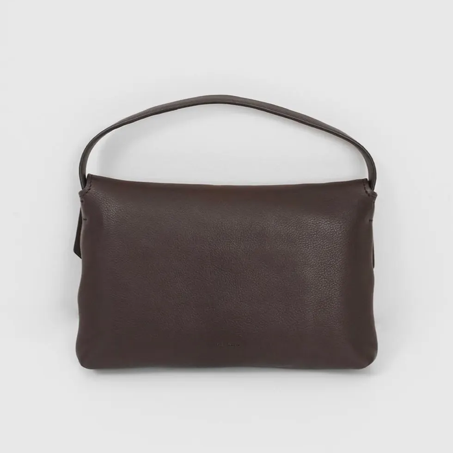 Chocolate Brown Fine Grain Soft Rectangular Mini Handbag With Teardrop Cutout Dome Snap Flap And Slim Curved Single Carry Loop