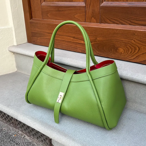 Grass Green Pebbled Grain Structured Tote With Scarlet Contrast Lining, Metallic Turn-Lock Front Strap And Dual Rounded Top Carry Handles