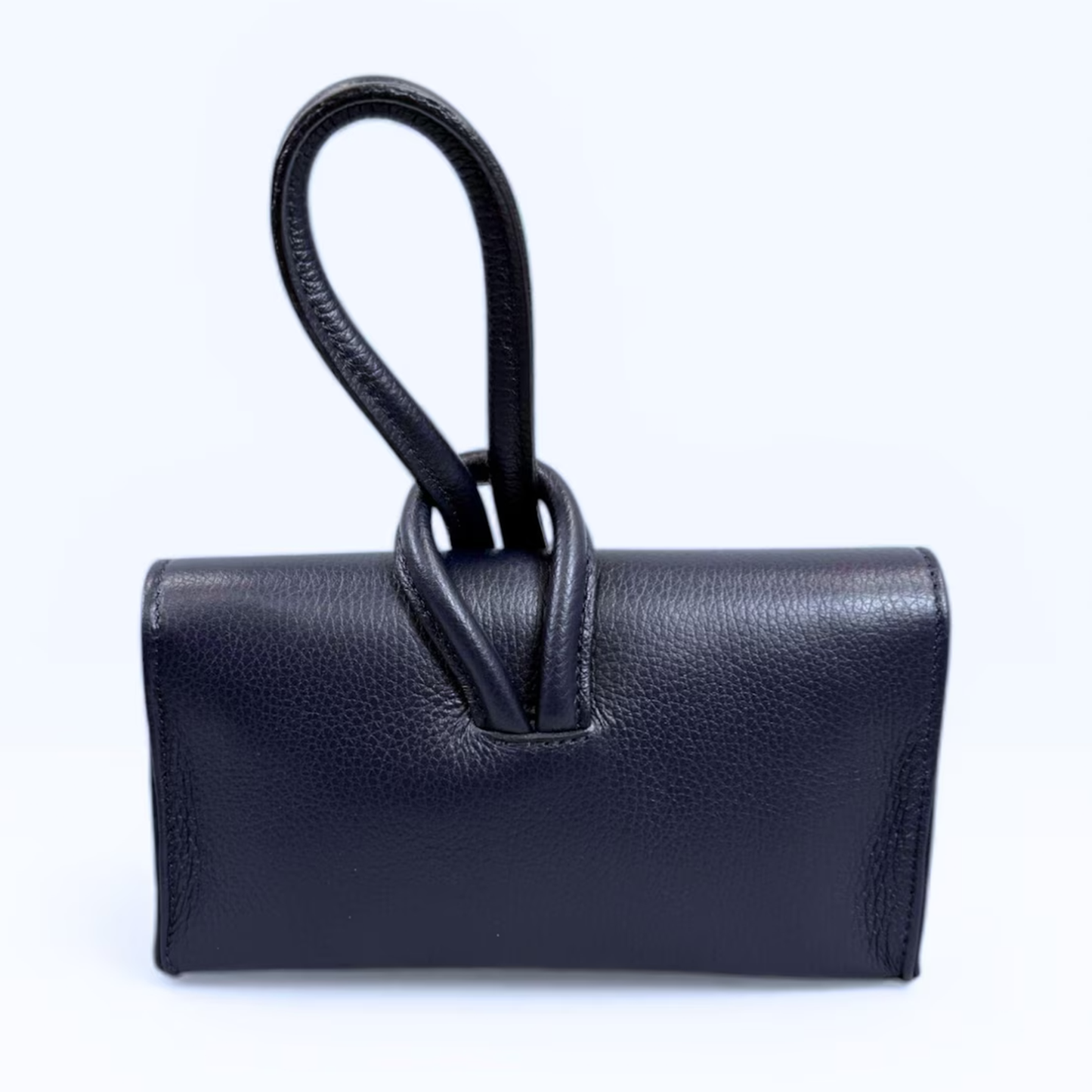 Grain Rectangular Wrist Clutch With Sculptural Knotted Loop Handle And Full Overlay Flap Closure