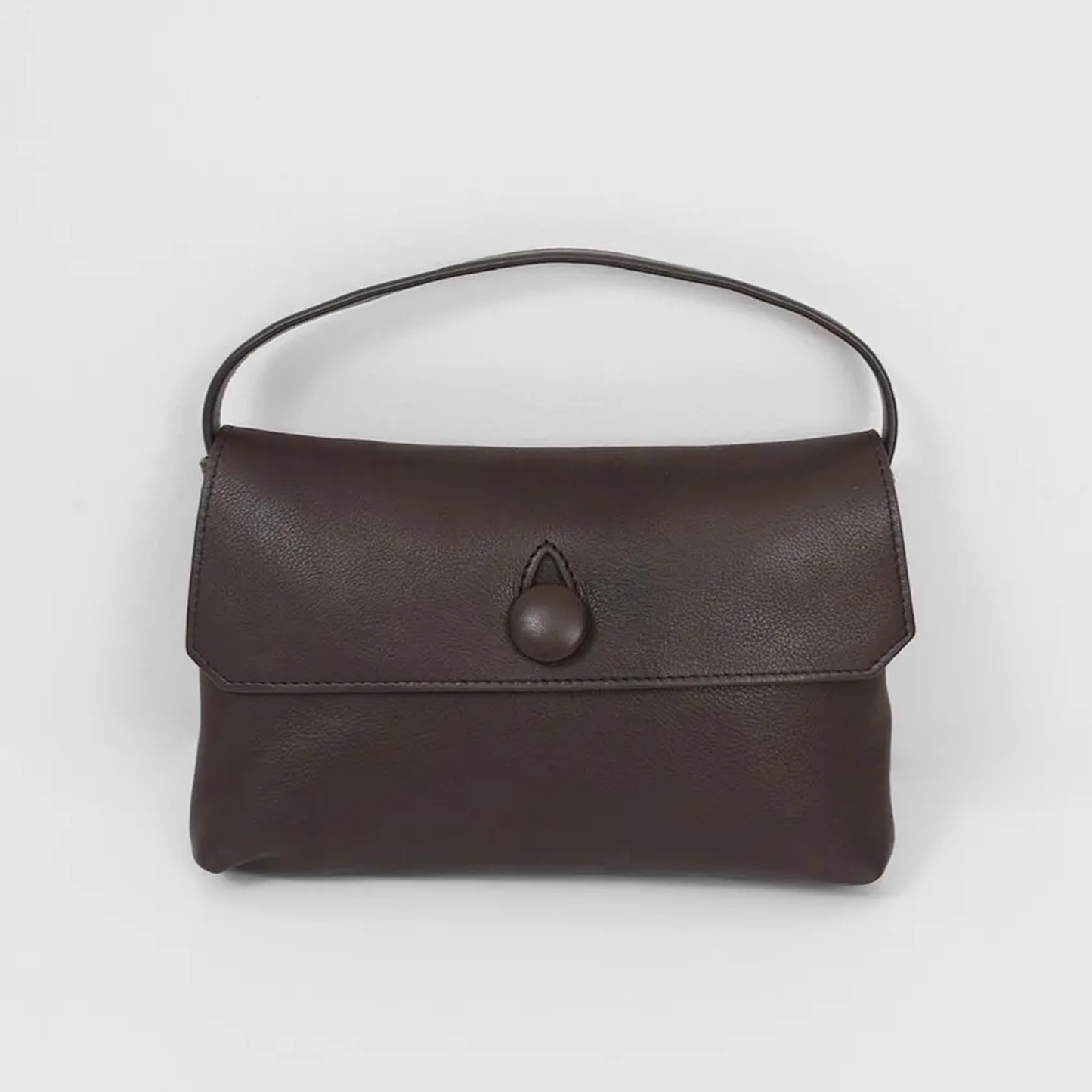 Chocolate Brown Fine Grain Soft Rectangular Mini Handbag With Teardrop Cutout Dome Snap Flap And Slim Curved Single Carry Loop