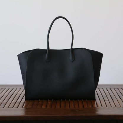Jet Black Pebbled Grain Flared Side Large Tote With Dual Pairs Elongated Carry Loops, Pointed Stitched Tab Fixtures And Spacious Open Inner Storage Cavity