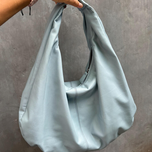 Pastel Baby Blue Smooth Supple Oversized Crescent Hobo Bag With Integrated Wide Shoulder Loop And Inner Curve Metallic Zip Closure